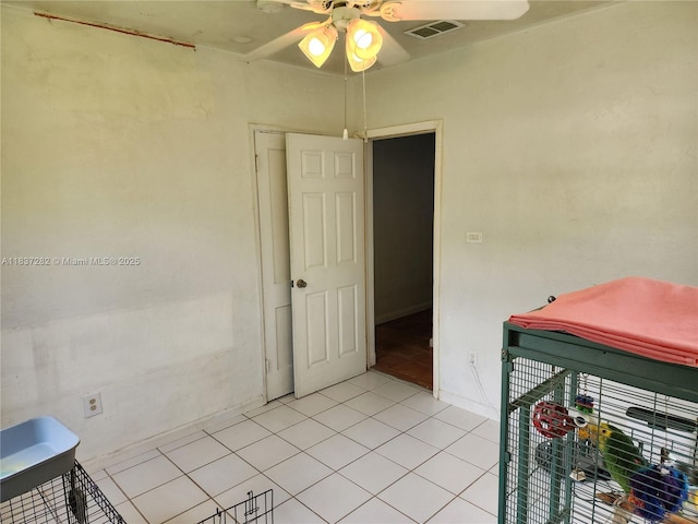 3521 E 8th Ave, Hialeah, FL 33013 - unfurnished room featuring ceiling fan and light tile patterned floors