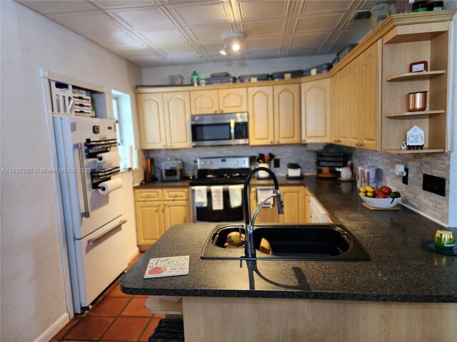 3521 E 8th Ave, Hialeah, FL 33013 - kitchen with stainless steel appliances, light brown cabinetry, backsplash, open shelves, and an ornate ceiling