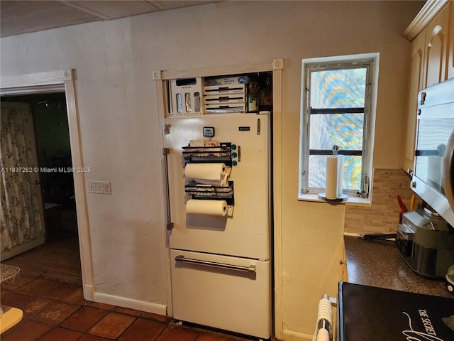 3521 E 8th Ave, Hialeah, FL 33013 - kitchen with freestanding refrigerator