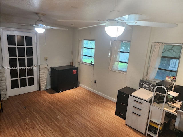 3521 E 8th Ave, Hialeah, FL 33013 - office space featuring a ceiling fan and light wood-style flooring