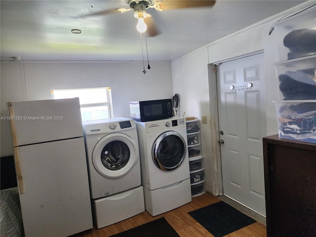 3521 E 8th Ave, Hialeah, FL 33013 - laundry room featuring independent washer and dryer, ceiling fan, and wood finished floors