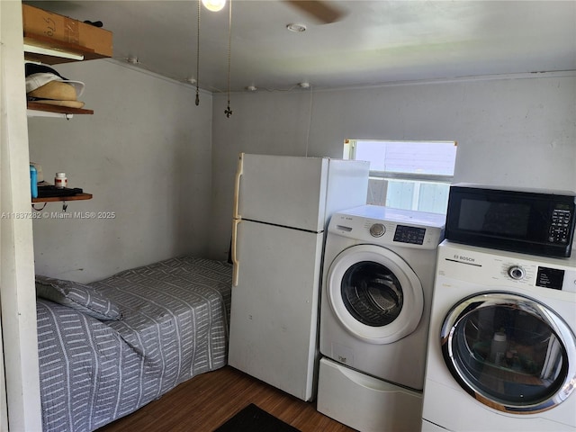 3521 E 8th Ave, Hialeah, FL 33013 - washroom with independent washer and dryer and wood finished floors