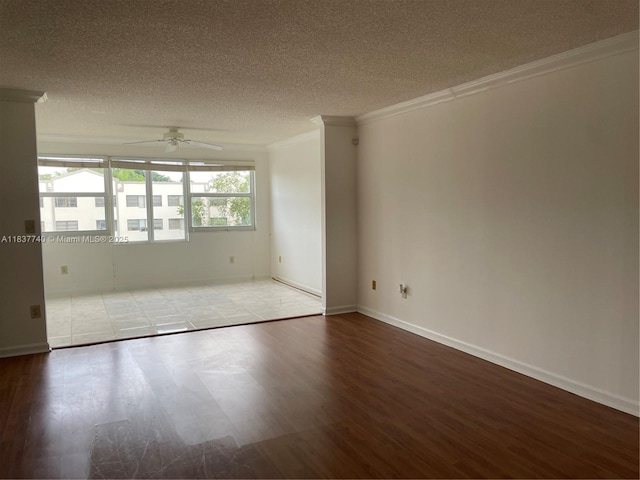 7152 S Devon Dr Unit 304, Tamarac, FL 33321 - unfurnished room with a ceiling fan, ornamental molding, a textured ceiling, and wood finished floors
