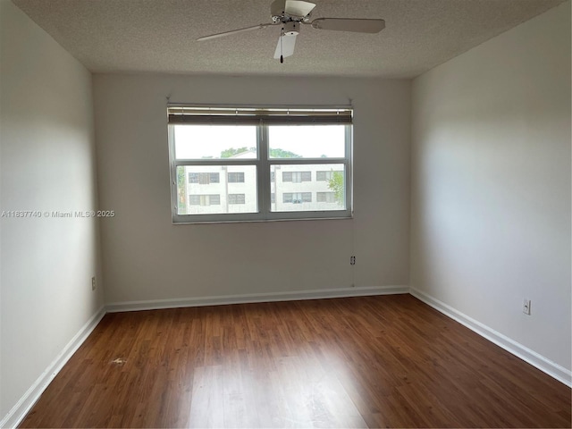 7152 S Devon Dr Unit 304, Tamarac, FL 33321 - spare room featuring healthy amount of natural light, wood finished floors, ceiling fan, and a textured ceiling