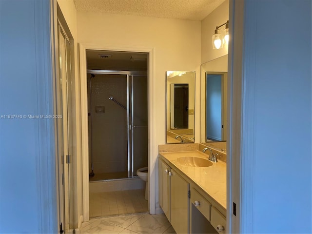 7152 S Devon Dr Unit 304, Tamarac, FL 33321 - full bathroom with vanity, a stall shower, marble finish flooring, and a textured ceiling