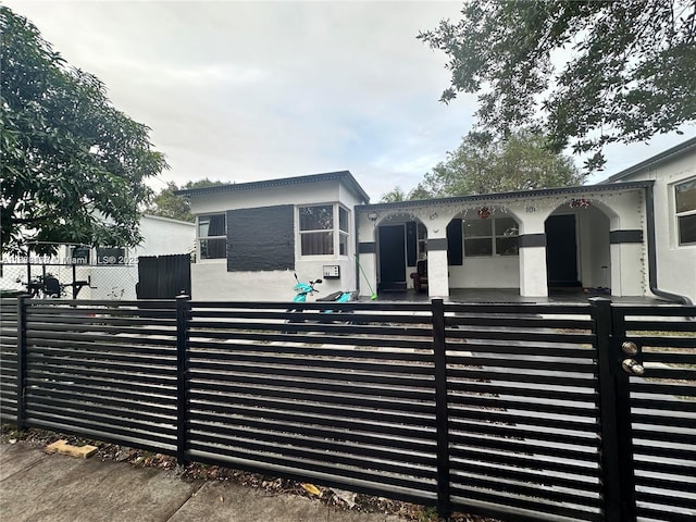 101 NW 68th Ter, Miami, FL 33150 - gate with a fenced front yard