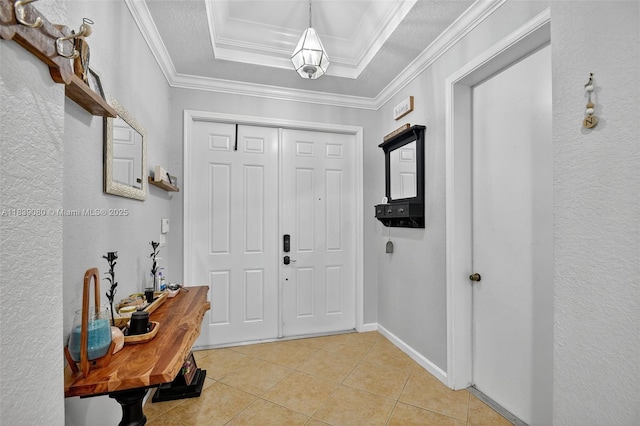 1086 Grove Park Cir, Boynton Beach, FL 33436 - entrance foyer with light tile patterned flooring, a raised ceiling, and crown molding