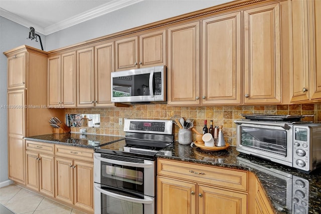 1086 Grove Park Cir, Boynton Beach, FL 33436 - kitchen with appliances with stainless steel finishes, ornamental molding, decorative backsplash, dark stone counters, and light tile patterned flooring