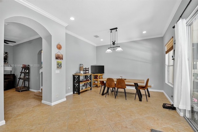 1086 Grove Park Cir, Boynton Beach, FL 33436 - dining room with arched walkways, light tile patterned floors, recessed lighting, crown molding, and stairs