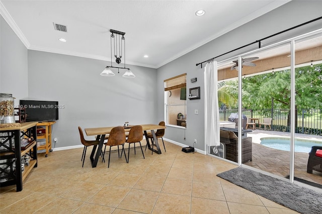 1086 Grove Park Cir, Boynton Beach, FL 33436 - dining area with light tile patterned floors, crown molding, and recessed lighting