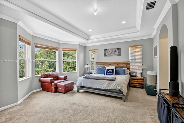1086 Grove Park Cir, Boynton Beach, FL 33436 - carpeted bedroom with multiple windows, a tray ceiling, crown molding, arched walkways, and recessed lighting