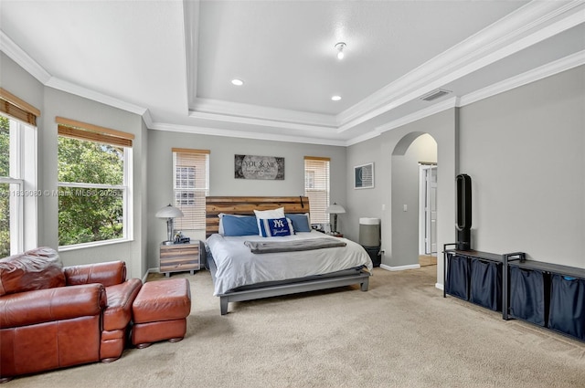1086 Grove Park Cir, Boynton Beach, FL 33436 - carpeted bedroom with arched walkways, a raised ceiling, crown molding, and recessed lighting