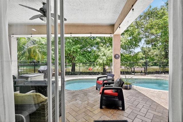 1086 Grove Park Cir, Boynton Beach, FL 33436 - view of swimming pool with a patio, a fenced backyard, and ceiling fan