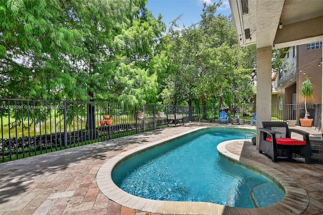 1086 Grove Park Cir, Boynton Beach, FL 33436 - view of swimming pool with a patio area and view of wooded area