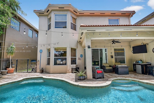1086 Grove Park Cir, Boynton Beach, FL 33436 - rear view of property with ceiling fan, stucco siding, a patio, and a tile roof