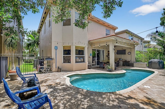 1086 Grove Park Cir, Boynton Beach, FL 33436 - back of house featuring a patio area, stucco siding, and a tiled roof