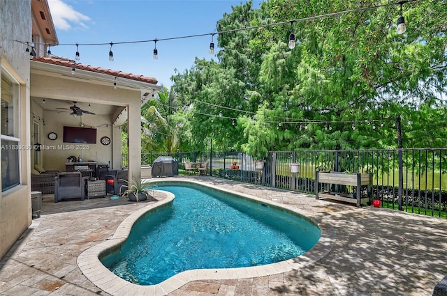 1086 Grove Park Cir, Boynton Beach, FL 33436 - view of swimming pool with ceiling fan, a patio, and a fenced backyard