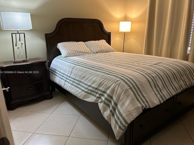 1206 Bahama Bnd Unit F2, Coconut Creek, FL 33066 - bedroom with light tile patterned flooring