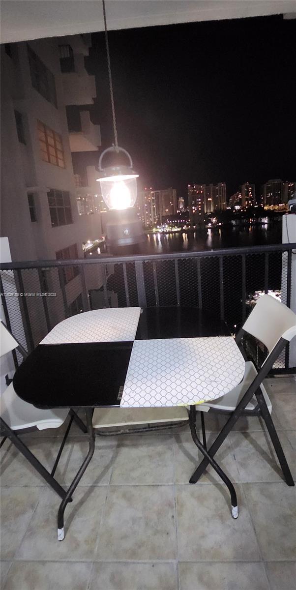 2750 NE 183rd St Unit 1701, Aventura, FL 33160 - balcony at twilight with a view of city lights