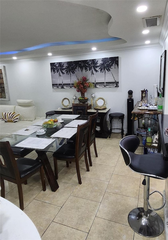 2750 NE 183rd St Unit 1701, Aventura, FL 33160 - dining area with crown molding, light tile patterned floors, recessed lighting, and a raised ceiling