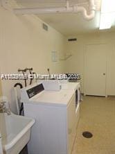 2750 NE 183rd St Unit 1701, Aventura, FL 33160 - washroom featuring a sink