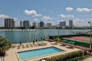 2750 NE 183rd St Unit 1701, Aventura, FL 33160 - community pool featuring a water view, a skyline view, and a patio