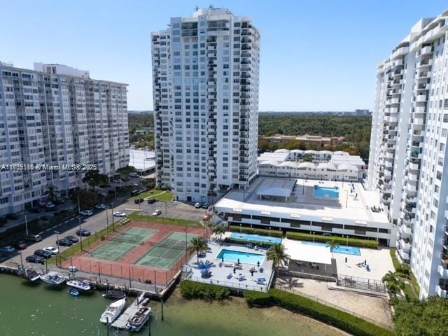 2750 NE 183rd St Unit 1701, Aventura, FL 33160 - aerial view of a pool area and a nearby body of water