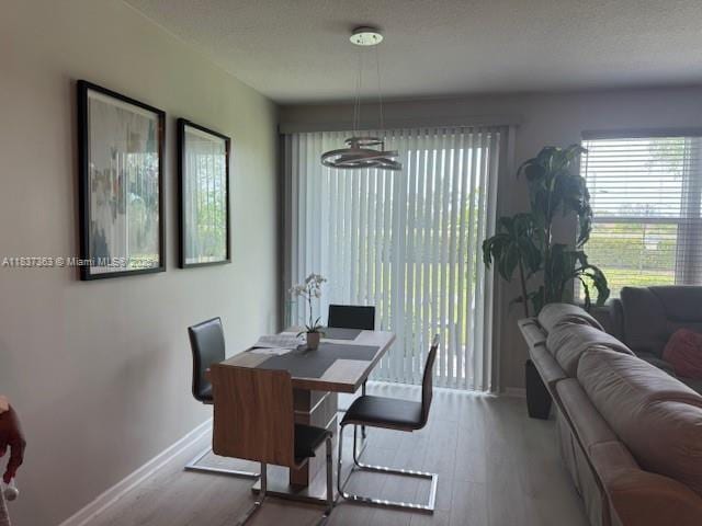 6349 Topsail Dr, West Palm Beach, FL 33413 - dining space with wood finished floors
