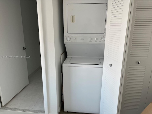 234 NE 3rd St Unit 905, Miami, FL 33132 - laundry area featuring stacked washing machine and dryer