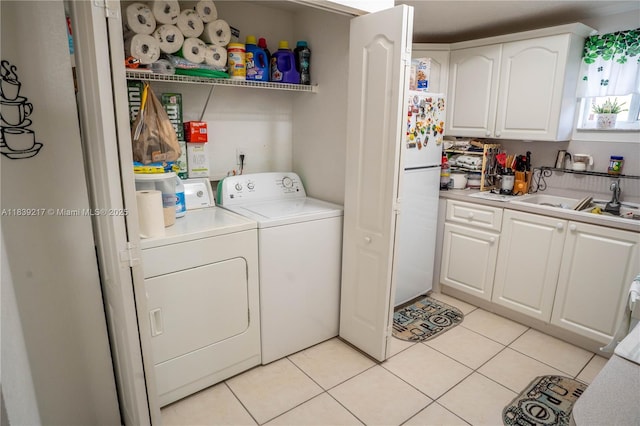 17425 NW 75th Pl Unit 101, Hialeah, FL 33015 - laundry area featuring washing machine and clothes dryer and light tile patterned floors
