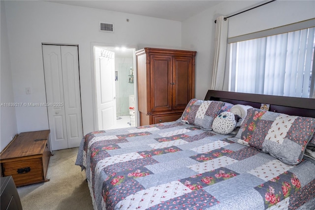 17425 NW 75th Pl Unit 101, Hialeah, FL 33015 - bedroom featuring light colored carpet and ensuite bathroom