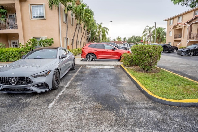 17425 NW 75th Pl Unit 101, Hialeah, FL 33015 - view of uncovered parking lot