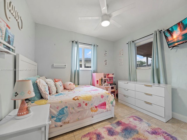2812 SW 65th Ave, Miramar, FL 33023 - bedroom featuring multiple windows, light tile patterned floors, and a ceiling fan