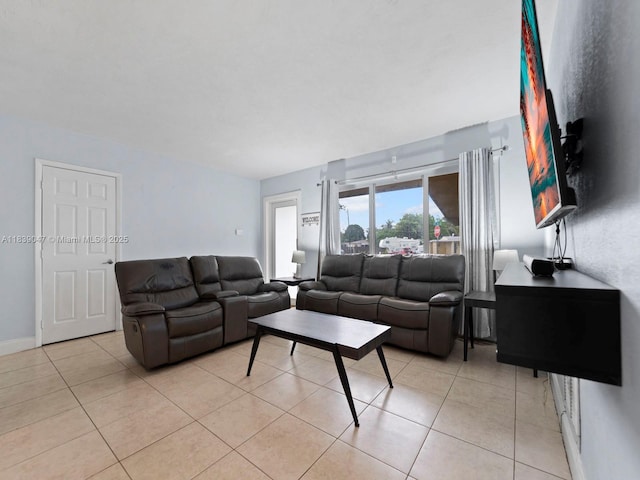 2812 SW 65th Ave, Miramar, FL 33023 - living room with light tile patterned floors and baseboards