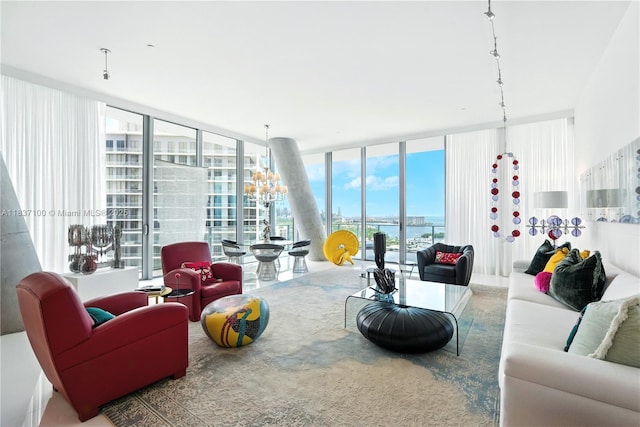 2675 S Bayshore Dr Unit 1601S, Miami, FL 33133 - living area with a wall of windows and a water view