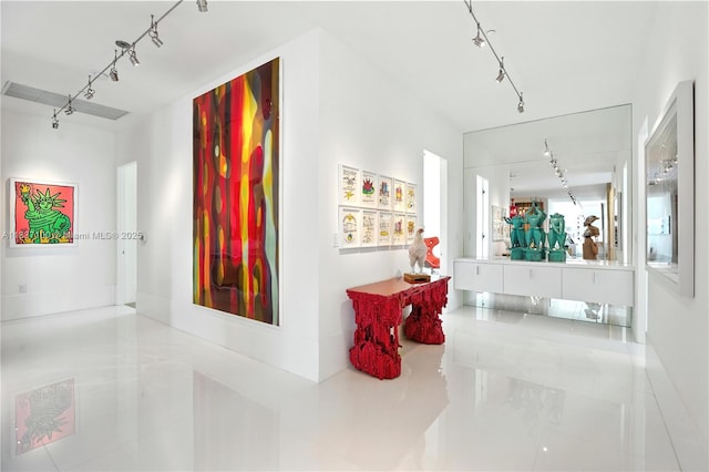 2675 S Bayshore Dr Unit 1601S, Miami, FL 33133 - corridor with rail lighting and tile patterned floors
