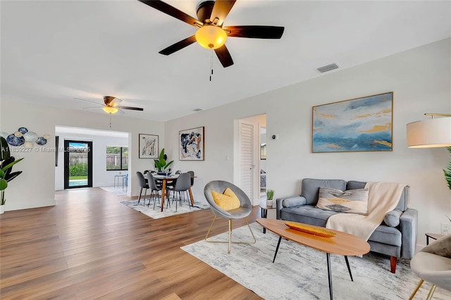 3141 SW 20th St, Fort Lauderdale, FL 33312 - living area with ceiling fan and wood finished floors