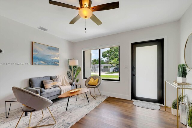 3141 SW 20th St, Fort Lauderdale, FL 33312 - living room featuring wood finished floors and ceiling fan