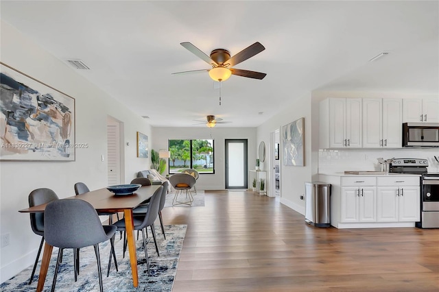 3141 SW 20th St, Fort Lauderdale, FL 33312 - dining room featuring ceiling fan and wood finished floors
