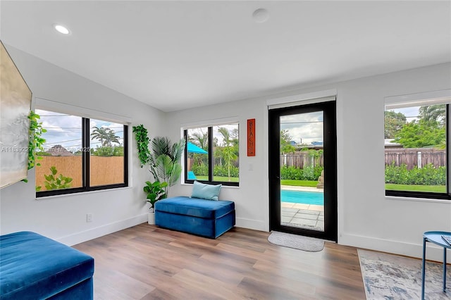 3141 SW 20th St, Fort Lauderdale, FL 33312 - living area with healthy amount of natural light, wood finished floors, and recessed lighting