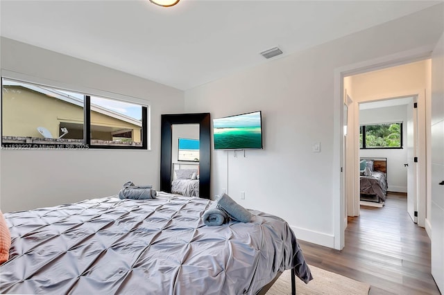 3141 SW 20th St, Fort Lauderdale, FL 33312 - bedroom featuring multiple windows and wood finished floors