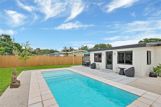 3141 SW 20th St, Fort Lauderdale, FL 33312 - view of swimming pool featuring a fenced backyard and a patio area