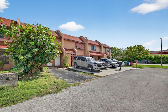 2767 NW 197th Ter, Miami Gardens, FL 33056 - view of property with uncovered parking and a residential view