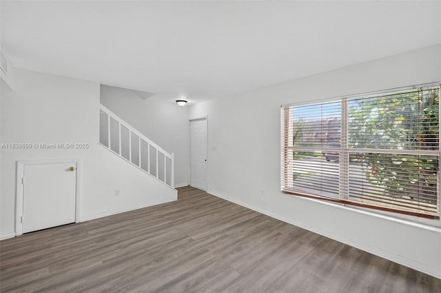 2767 NW 197th Ter, Miami Gardens, FL 33056 - spare room featuring wood finished floors and stairway