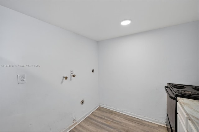 2767 NW 197th Ter, Miami Gardens, FL 33056 - laundry room with light wood-type flooring and gas dryer hookup