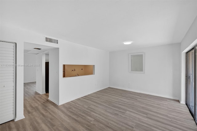 2767 NW 197th Ter, Miami Gardens, FL 33056 - unfurnished room with wood finished floors and baseboards