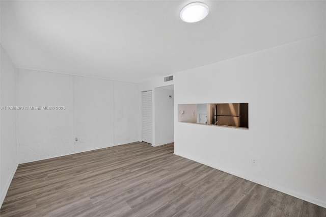 2767 NW 197th Ter, Miami Gardens, FL 33056 - unfurnished living room featuring wood finished floors