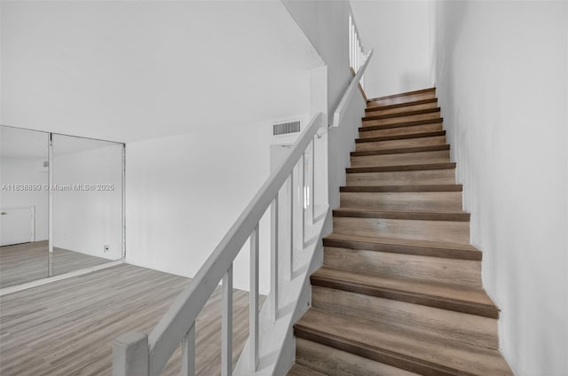 2767 NW 197th Ter, Miami Gardens, FL 33056 - stairway featuring wood finished floors