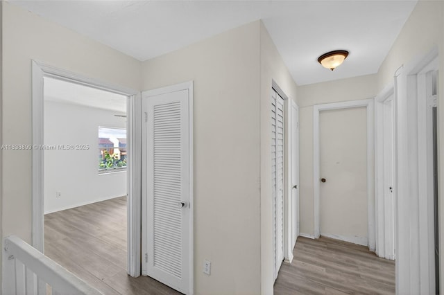 2767 NW 197th Ter, Miami Gardens, FL 33056 - hallway featuring wood finished floors and baseboards