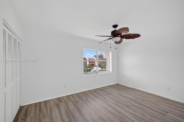 2767 NW 197th Ter, Miami Gardens, FL 33056 - unfurnished bedroom featuring wood finished floors, a closet, and ceiling fan